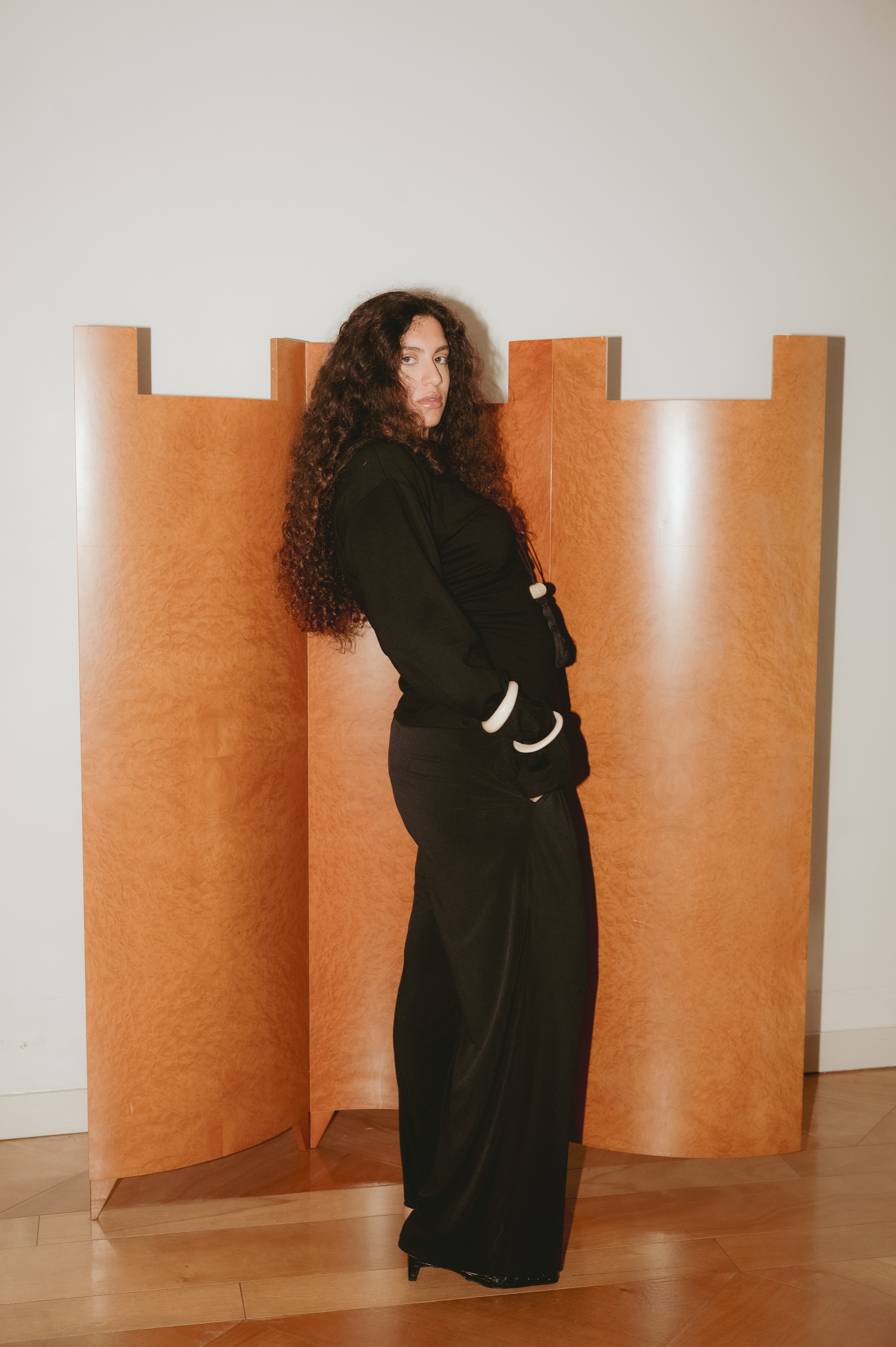 Woman wearing black suit and trouser for timeless daily fashion — VIVEH