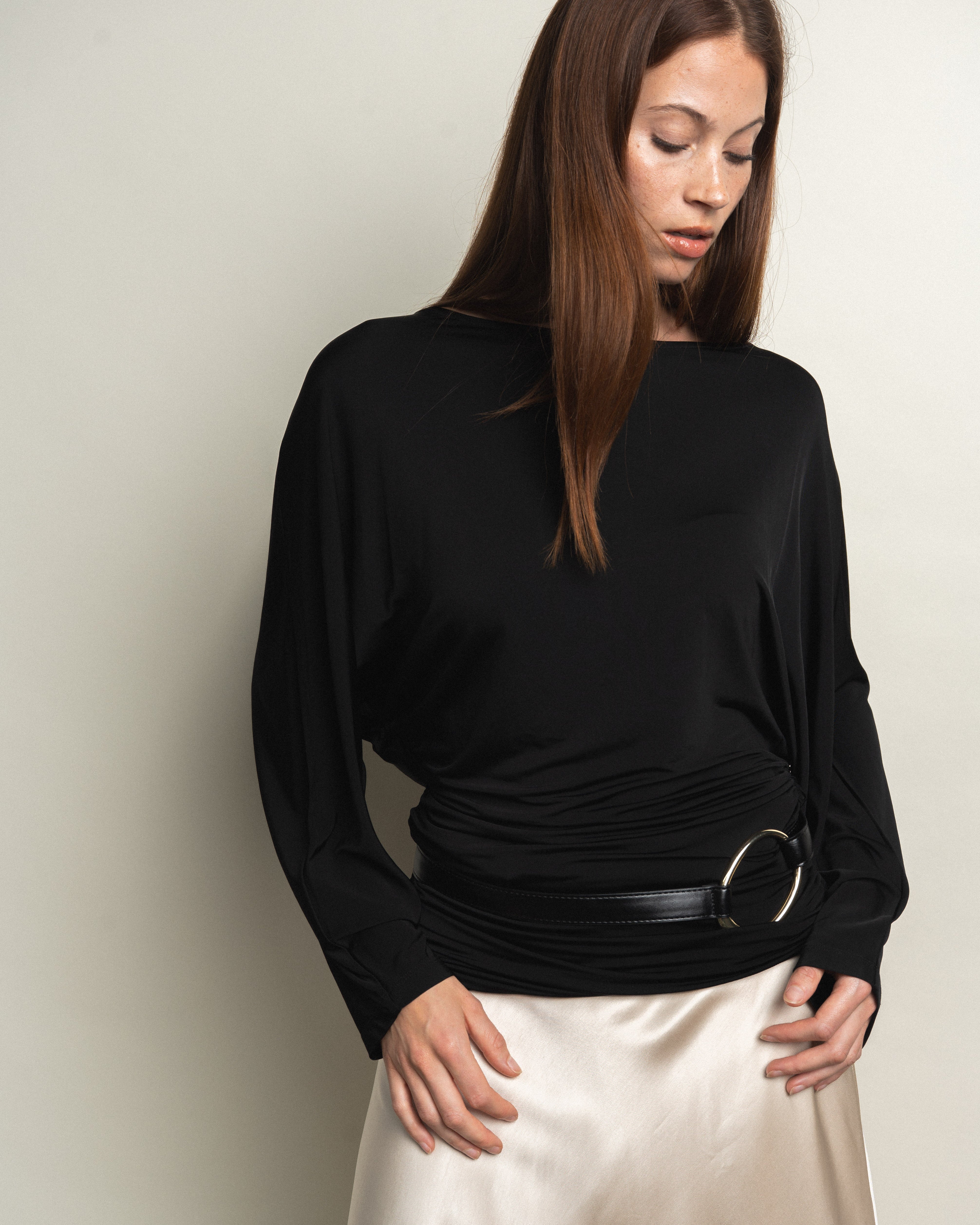 Woman wearing VIVEH black long sleeve top — casual and daily outfit